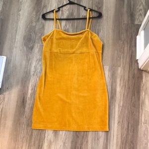 Beautiful yellow color. Short and tight dress